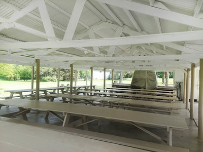 picnic shelter after new paint painted white