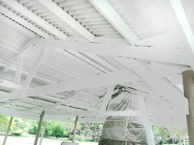 fresh coat of white paint on ceiling of picnic shelter